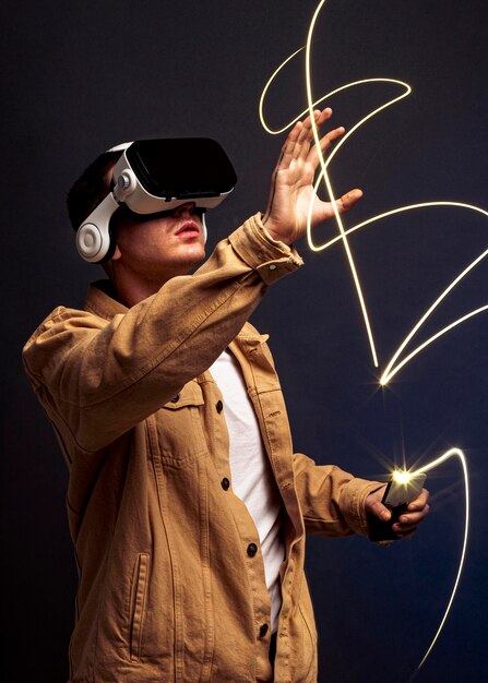 Young man wearing virtual reality goggles