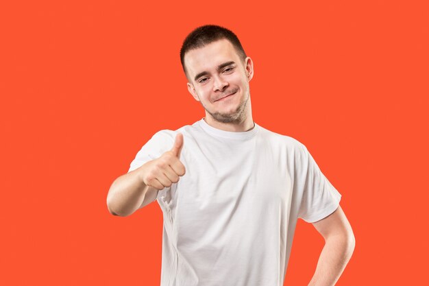 Young man in white Tshirt giving thumb up