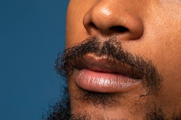 Young man with beard skin texture side view