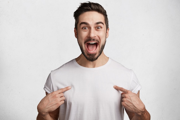 Young man with beard and white T-shirt