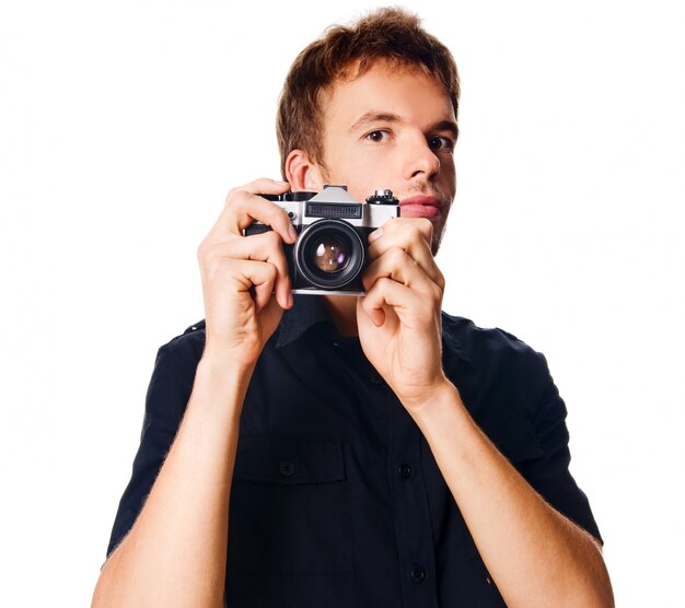 Young man with camera