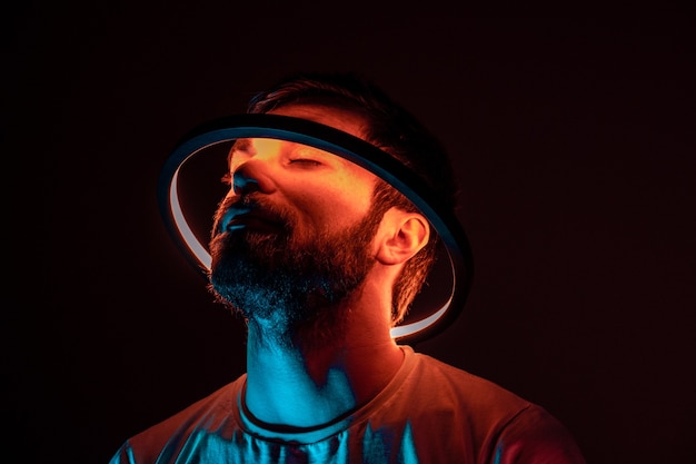 Young man with circle light around head