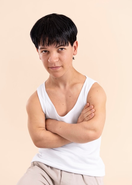 Free photo young man with dwarfism posing