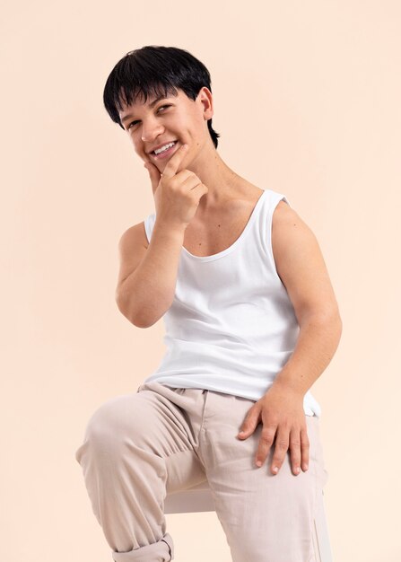 Young man with dwarfism posing
