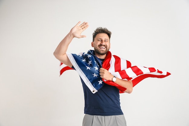 Free photo young man with the flag of united states of america