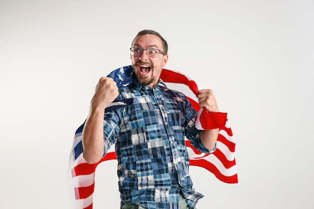 Free photo young man with the flag of united states of america