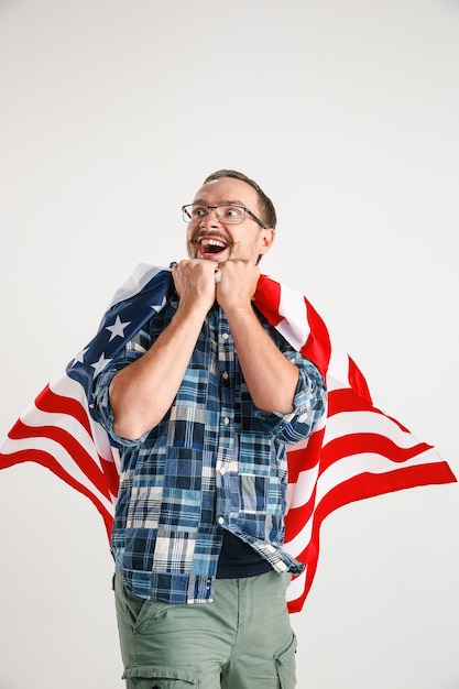 Free photo young man with the flag of united states of america