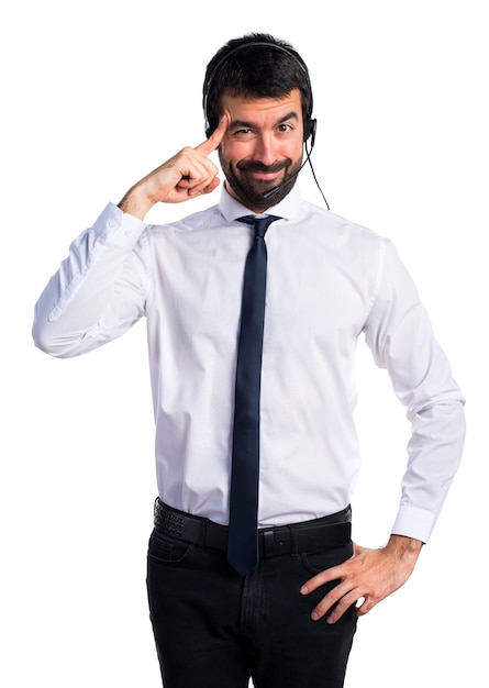 Young man with a headset thinking