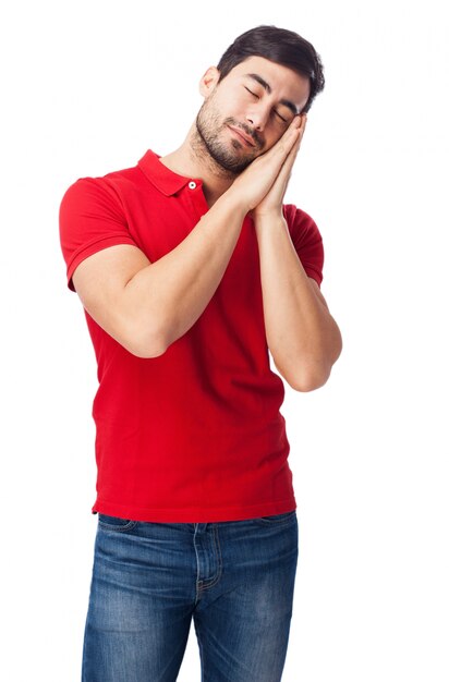 Young man with his head on his hands