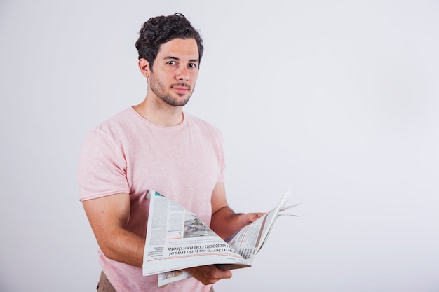 Young man with newspaper