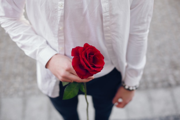 young man with rose