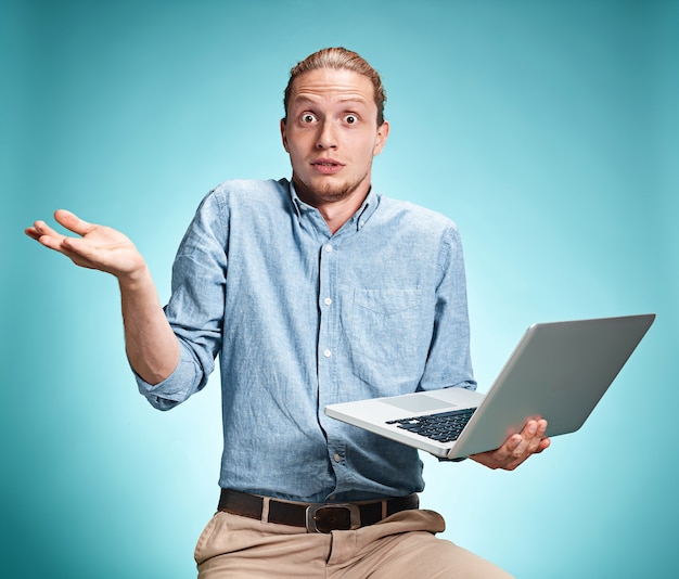 Young Man Working On Laptop