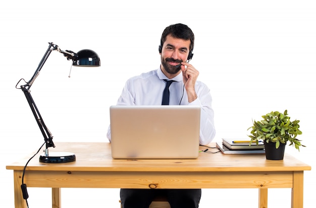 Young man working with a headset