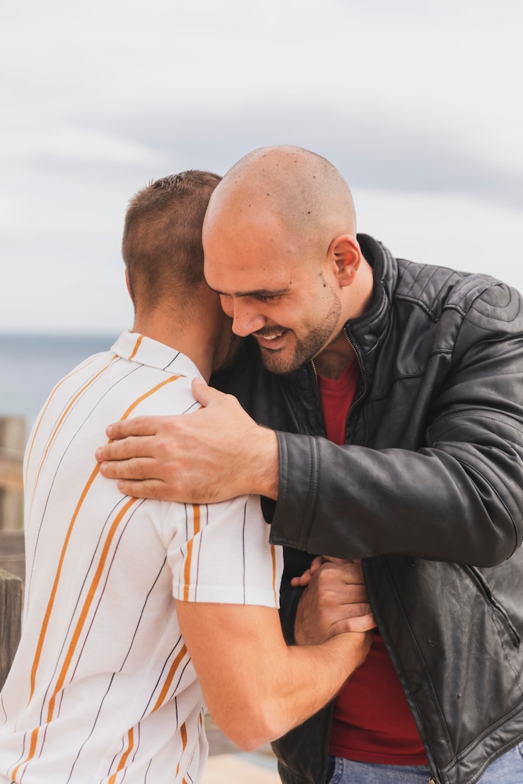 Free Photo young men hand shake