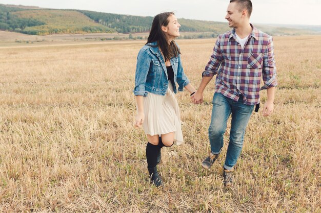 Young modern stylish couple outdoors