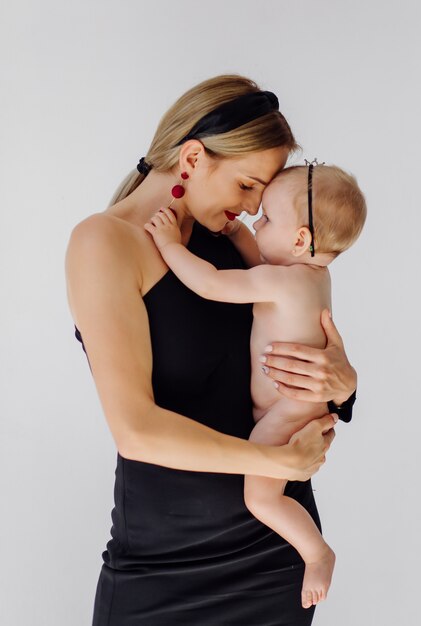 Young mother and her beautiful daughter 