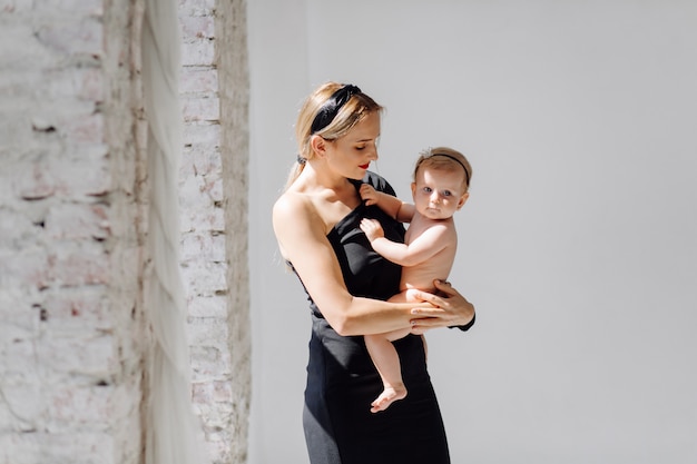 Young mother and her beautiful daughter 