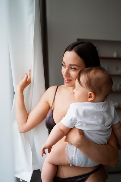 Young mother spending time with baby