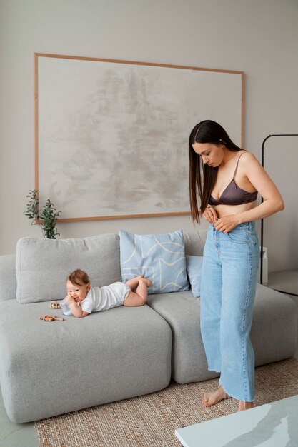 Young mother spending time with baby