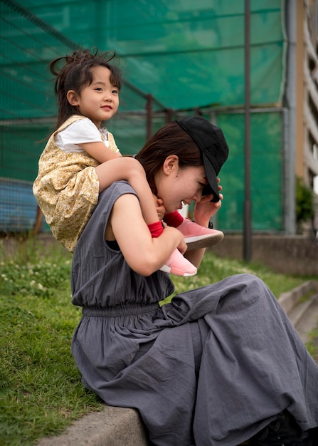 Young mother spending time with her daughter