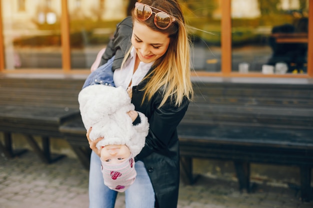 young mother with little daughter