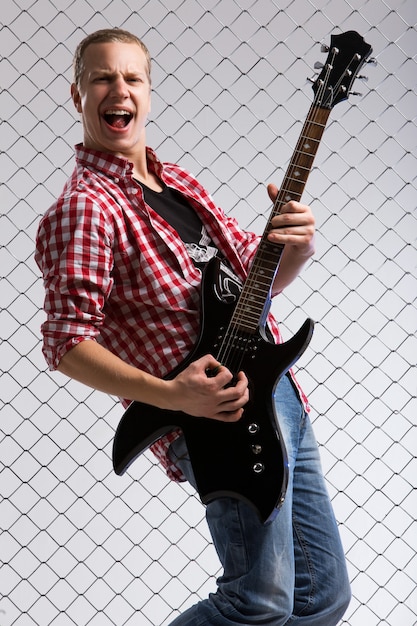 Young musician with a guitar