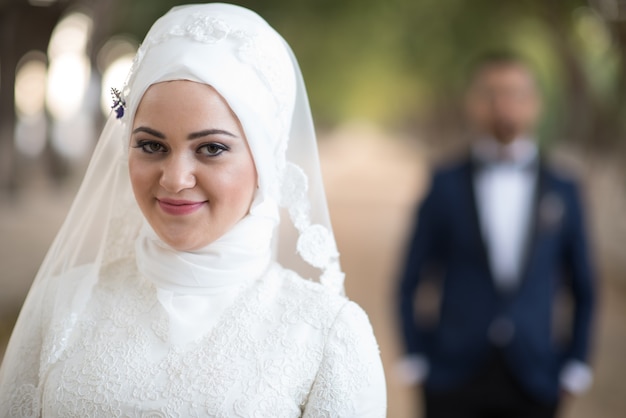 Free photo young muslim bride and groom wedding