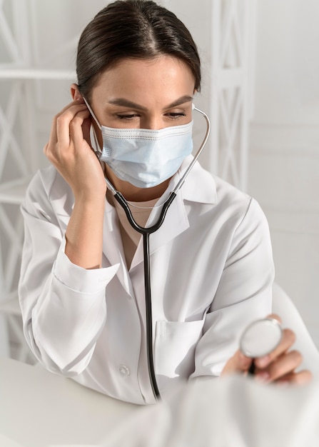 Young nurse holding a stethoscope