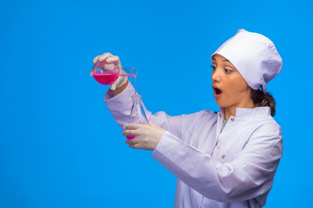 Young nurse makes laboratory tests. 