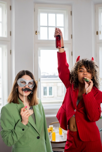 Young people at costumes party