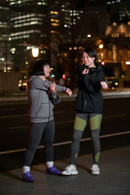 Young people getting ready for doing sport at night