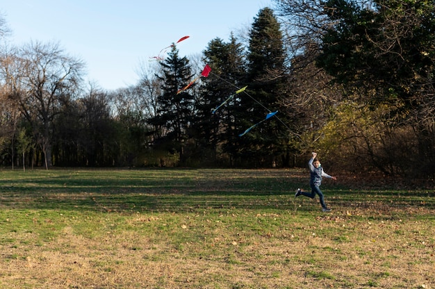 Young people getting their kite up