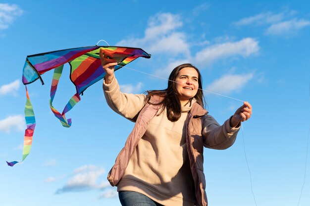 Young people getting their kite up