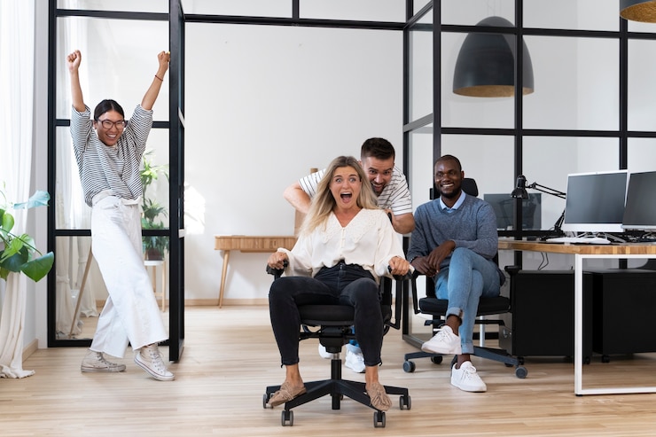 Free Photo young people having fun in work break