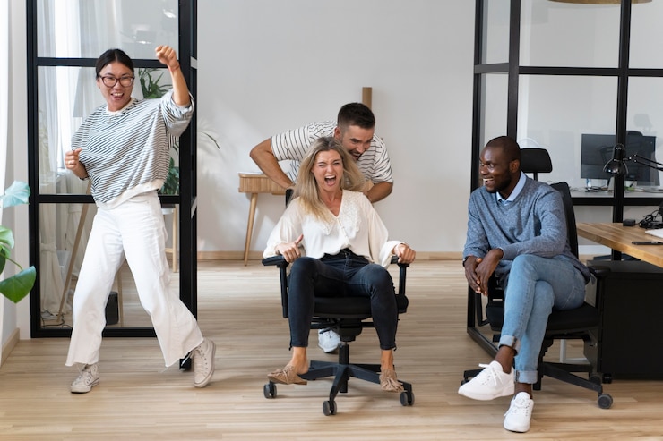 Free Photo young people having fun in work break