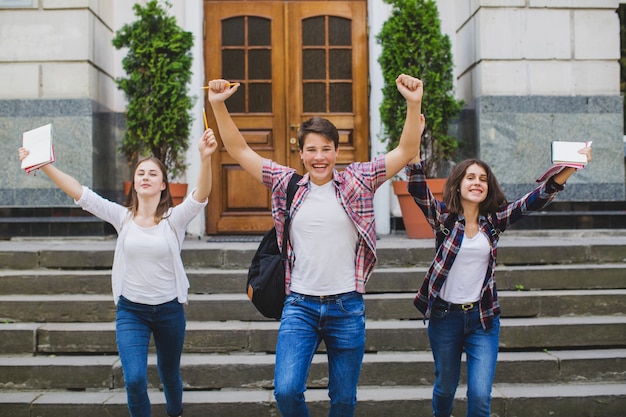 Free photo young people looking victorious