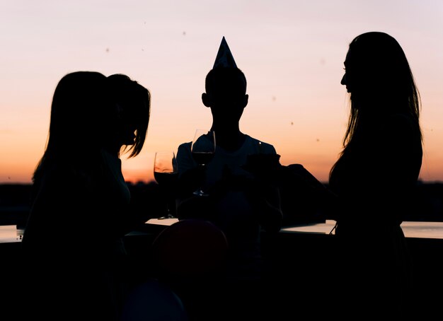 Young people at rooftop party 