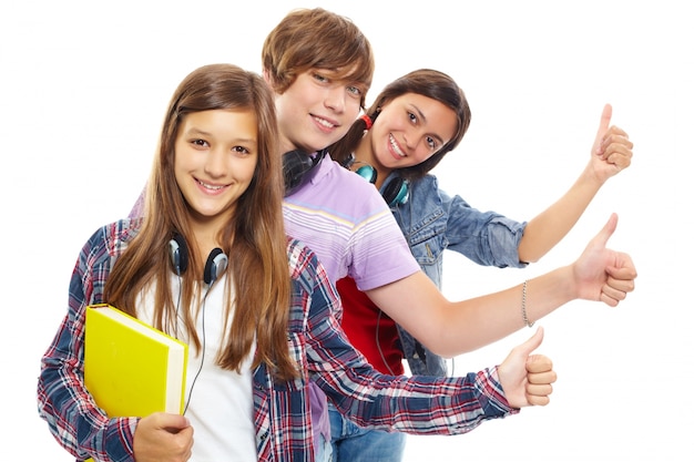 Young people in row with thumbs up