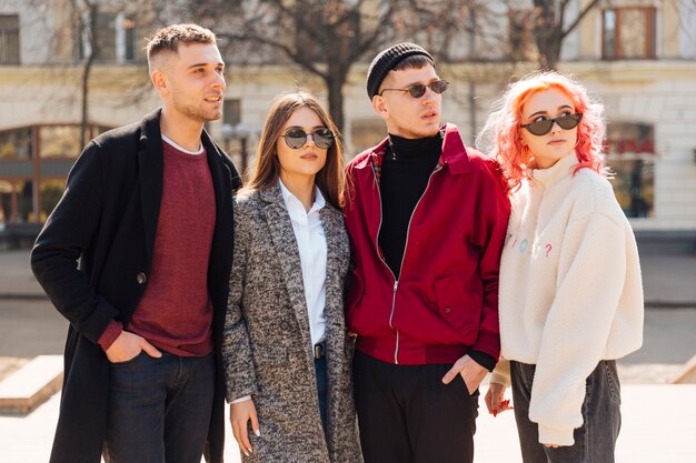 Young people standing and looking up