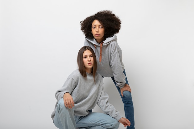 Young people wearing hoodie mockup