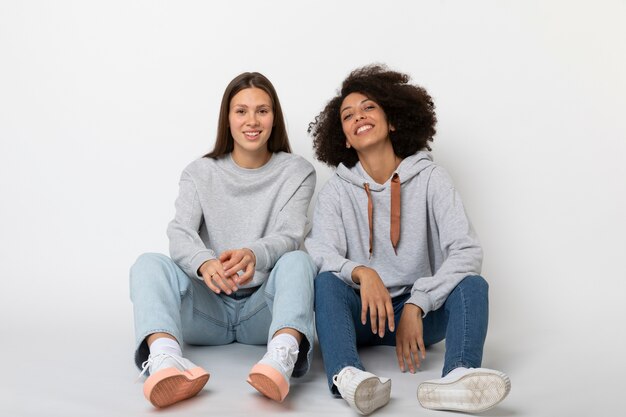 Young People Wearing Hoodie Mockup