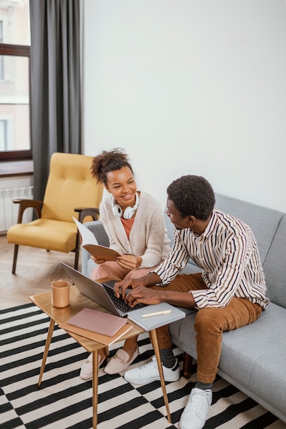 Young people working from a modern place