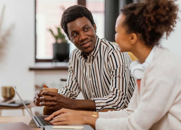 Young people working from a modern place