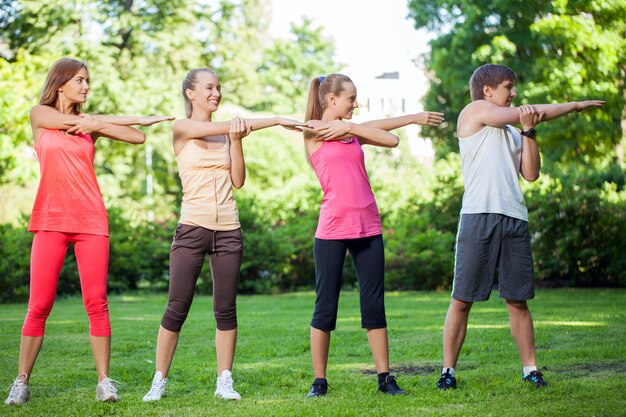 Young people working out in a park
