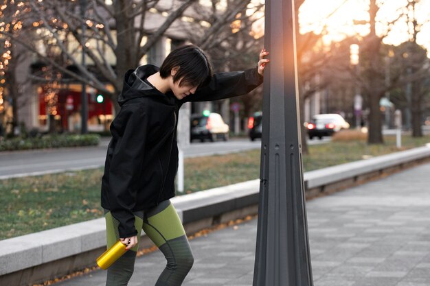 Young person getting ready for doing sport at night