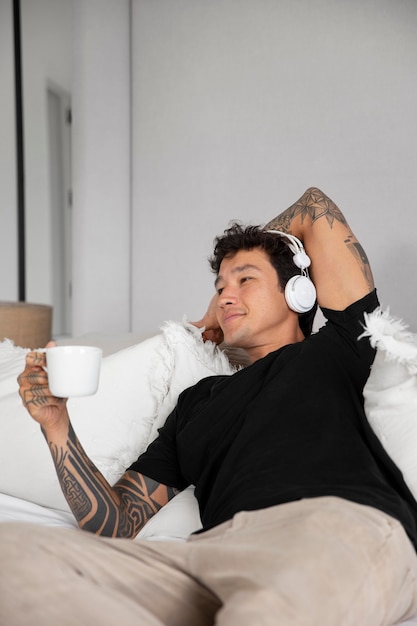 Young person relaxing while listening to music