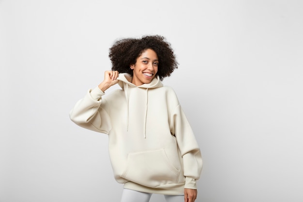 Free photo young person wearing hoodie mockup