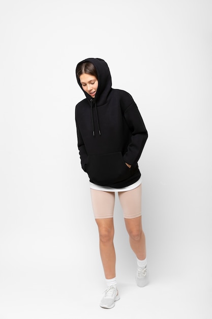 Free photo young person wearing hoodie mockup