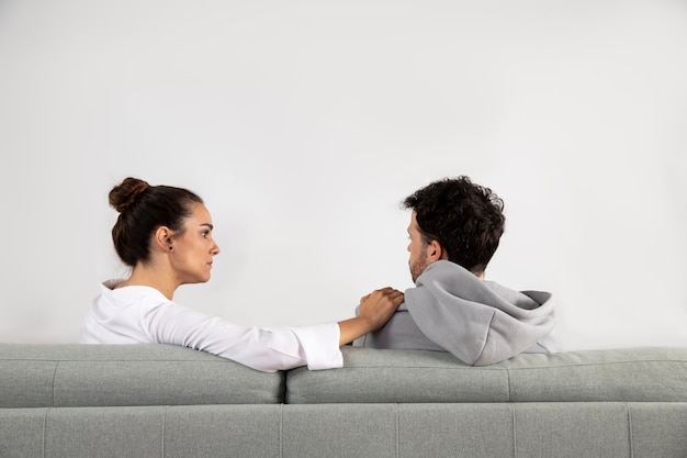 Young person with anxiety talking to specialist