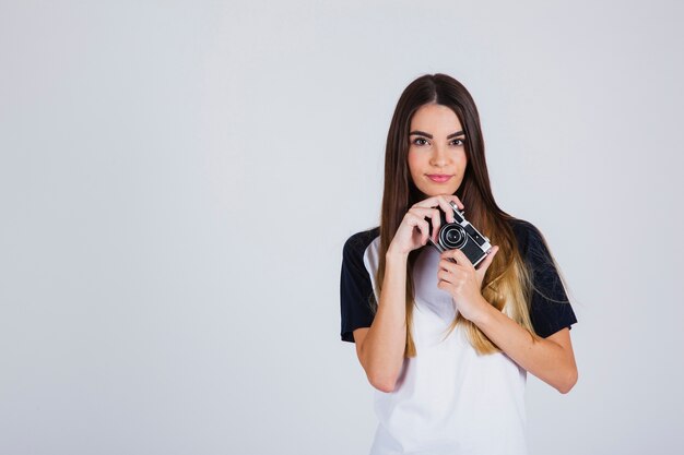 Young photographer posing